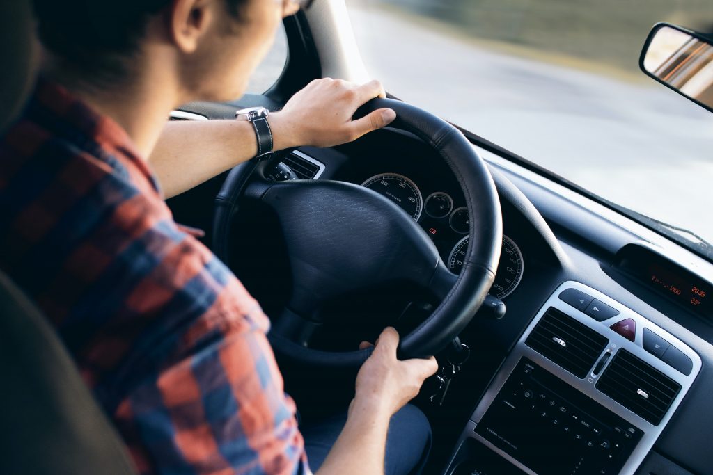 Teenager driving a car