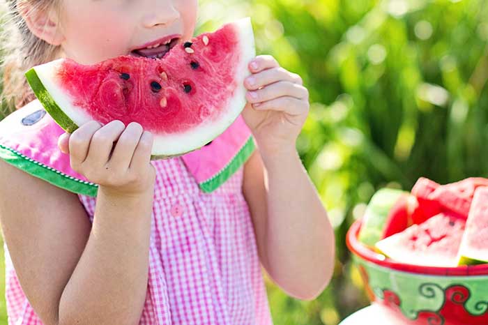 kid eating watermellon 