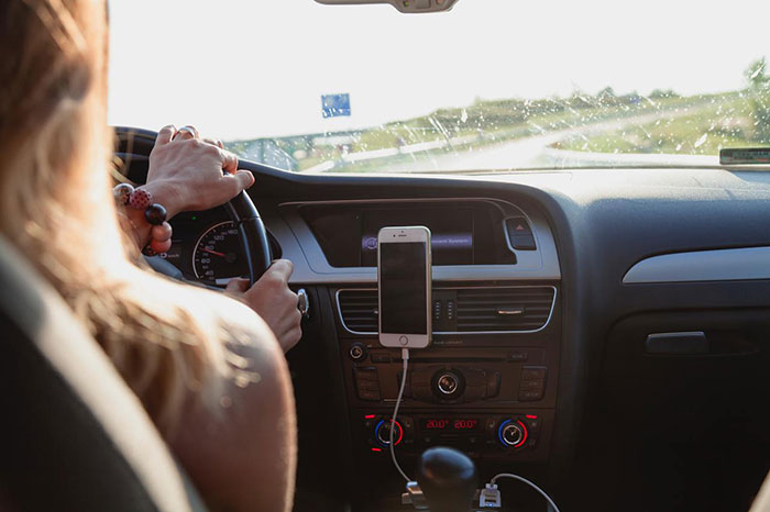 women driving a car