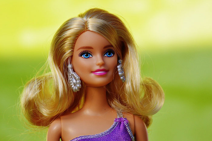 barbie doll with blur background