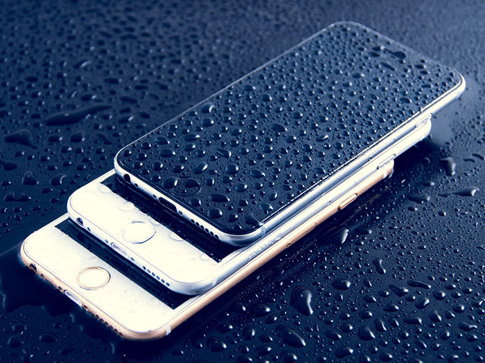 iPhone with water drops on it