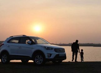 Sunset and family car