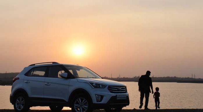 Sunset and family car