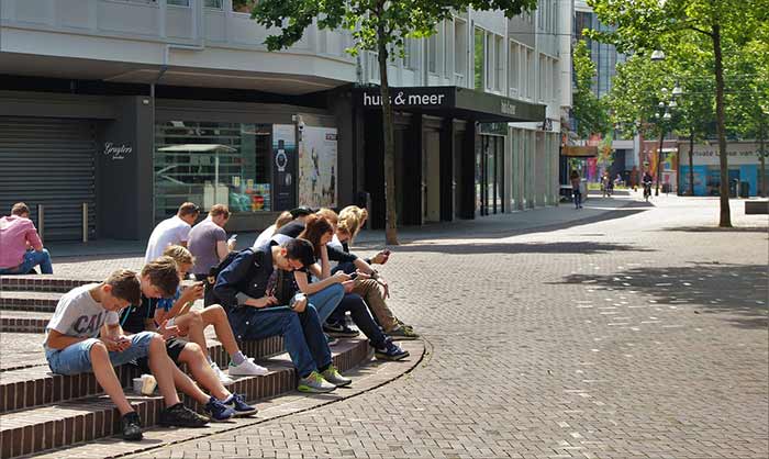 everyone using mobile phone