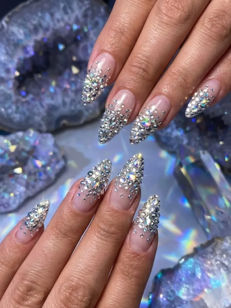 Clear stiletto nails fully encrusted in Swarovski crystals for a couture luxury 30th birthday party look
