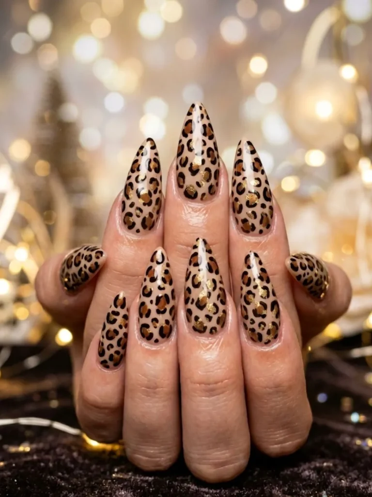 Hand-painted leopard print stiletto nails with matte topcoat for a fierce 30th birthday night out