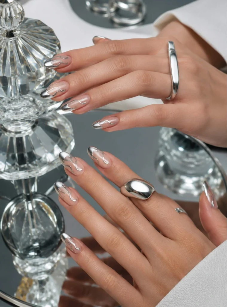 Silver chrome swirl French tip nail art